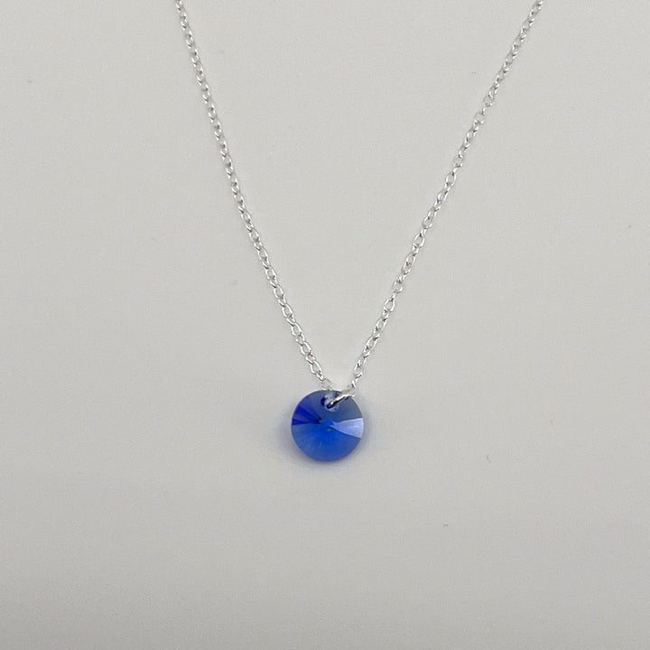 Aqlaperlis Jewellery: Sapphire Blue Round Cut Crystal Necklace