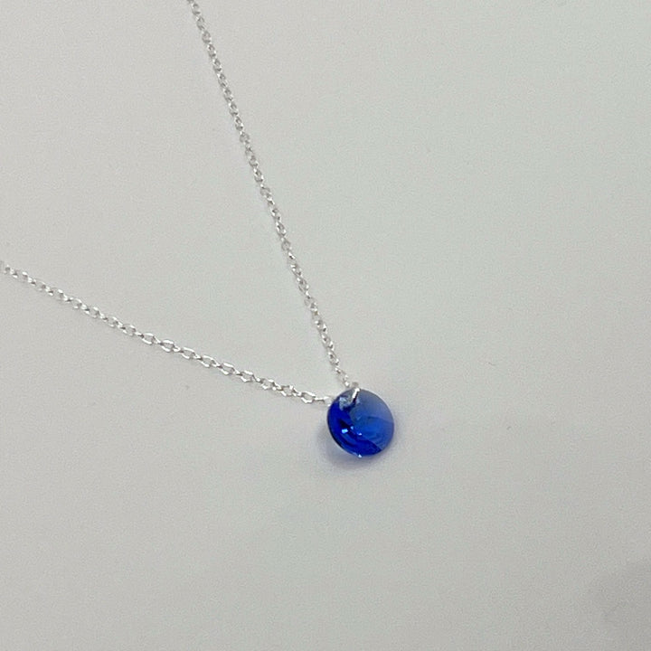 Aqlaperlis Jewellery: Sapphire Blue Round Cut Crystal Necklace